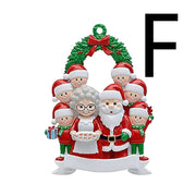 Christmas wooden pendant decoration featuring Santa, Mrs. Claus, elves, and a wreath with a red bow