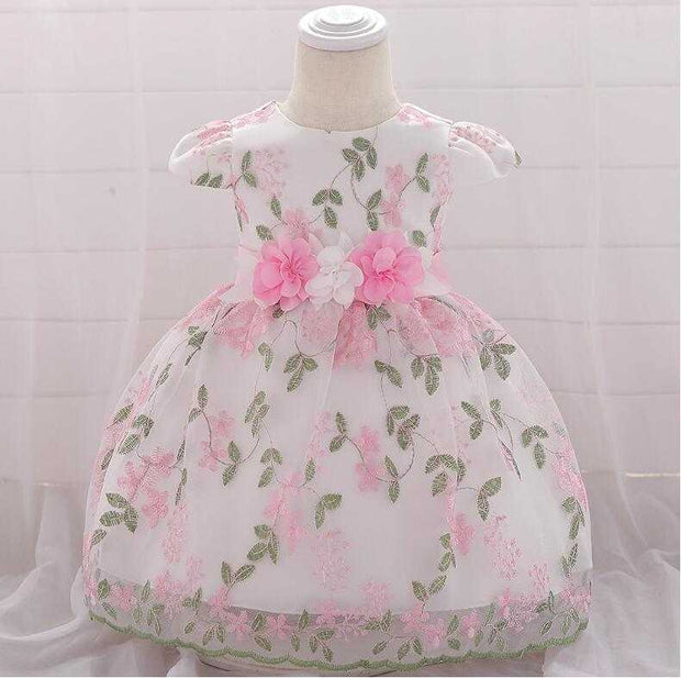 Summer floral baby girl dress with pink flowers and green leaves for birthday and wedding parties
