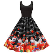 Valentine's Day print party dress with black top and festive skirt featuring cats, gifts, and musical notes