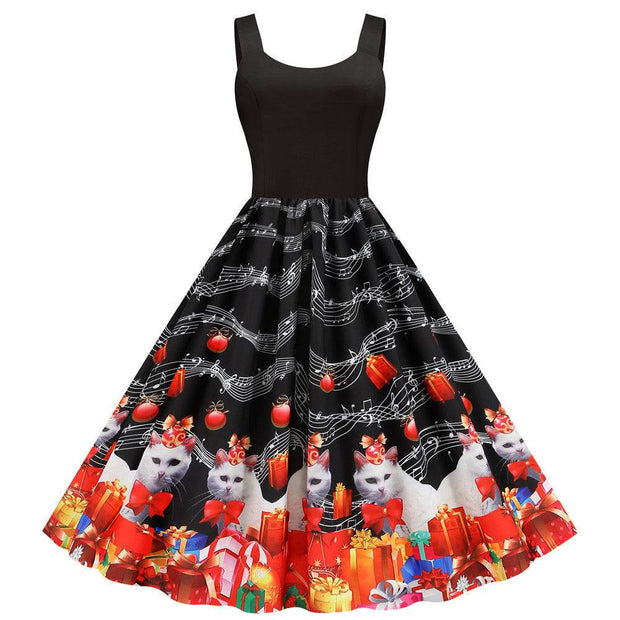 Valentine's Day print party dress with black top and festive skirt featuring cats, gifts, and musical notes