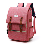 Vintage pink canvas backpack for men and women with leather straps, USB charging port, and multiple compartments for school and travel use