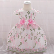 Floral pink and white fluffy children's party dress for baby girls with flower decorations