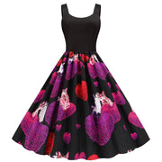 Valentine's Day print party dress with black top and heart-patterned skirt featuring cats and purple-red designs