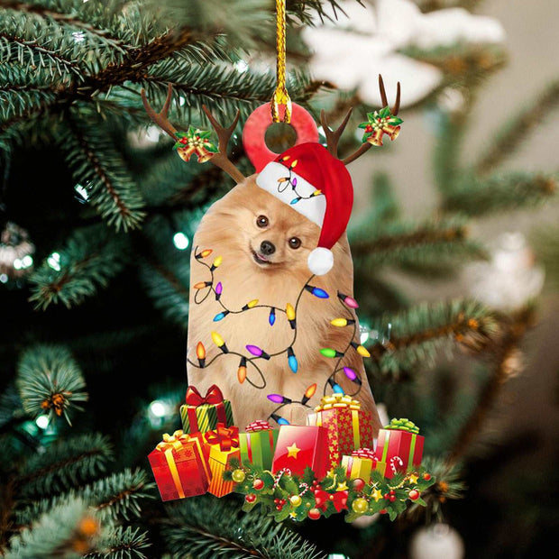 Christmas wooden pendant decoration featuring a dog in a Santa hat with holiday lights and gifts hanging on a Christmas tree