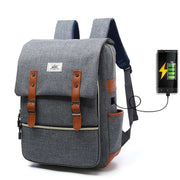 Vintage men women canvas backpack with USB charging port, laptop compartment, and brown leather straps for school and travel