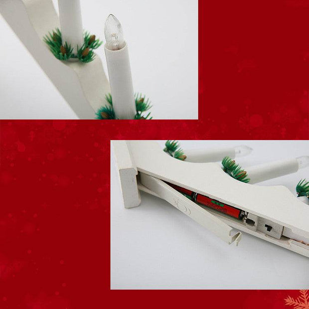 Wooden Christmas window decorations white candlestick with LED and green pine detail battery compartment visible