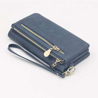 Blue women's long wallet with zipper and wrist strap made of PU leather