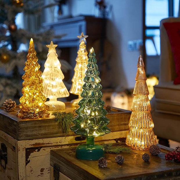 Glowing geometric glass Christmas tree table decorations for festive holiday scenes