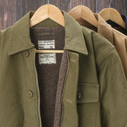 Men padded work clothes thickened cotton jacket with velvet lining in khaki, army green, and brown colors on wooden hangers