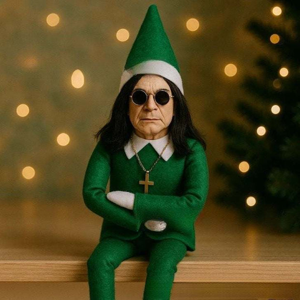 resin Christmas Oz Doll elf decoration in green outfit with hat and sunglasses