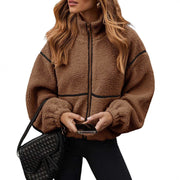 Brown Berber fleece jacket with contrast black piping and stand-up collar for women