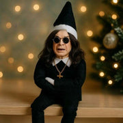 Christmas Oz Doll resin elf decoration in black outfit with glasses and cross necklace