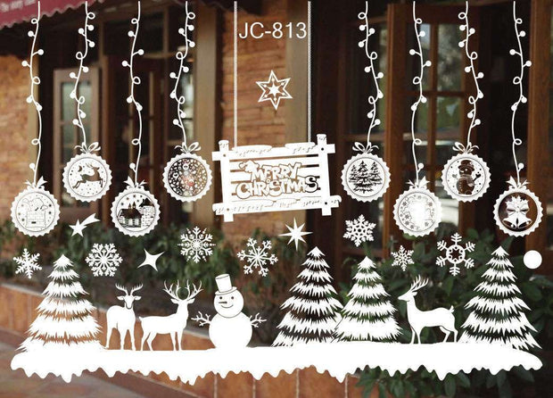 White Christmas window stickers with snowflakes, trees, reindeer, snowman, and "Merry Christmas" sign decoration