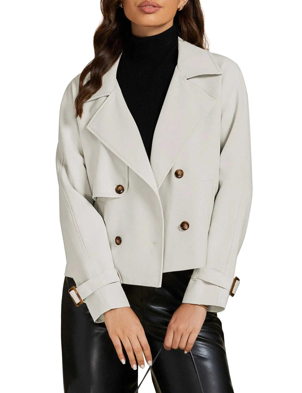 Women's fashion office jacket with notched lapel, double-breasted design, and buckle sleeves in light beige.