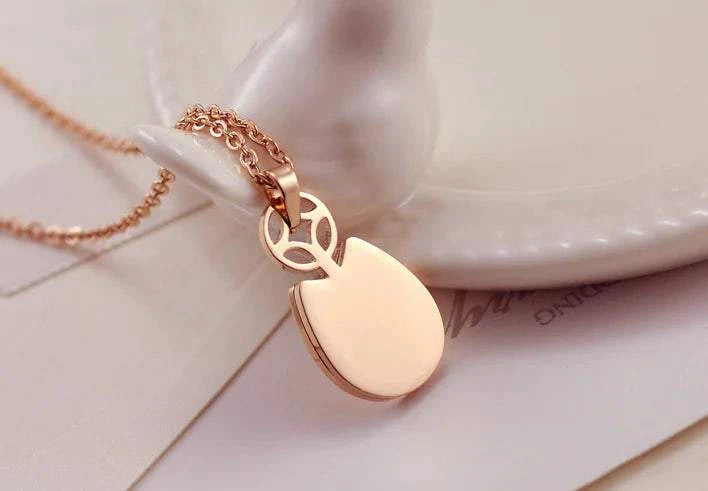 Totoro Necklace-Wealth Necklace-Rose Gold Titanium Steel featuring a leaf design pendant on a delicate chain.