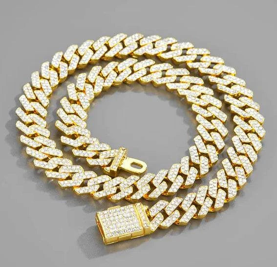 Necklace - Dazzling Diamond-Encrusted Hip-Hop Jewelry, featuring a gold chain adorned with sparkling diamonds.