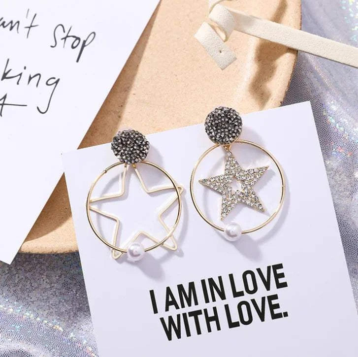 Round Earrings Long Earrings Rhinestone Pearl Earrings featuring star designs with pearl accents on a stylish card.