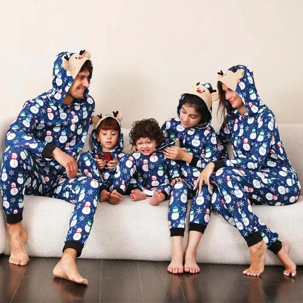 Family wearing matching Christmas snowman print hooded pajamas with deer ears in blue winter romper pajamas