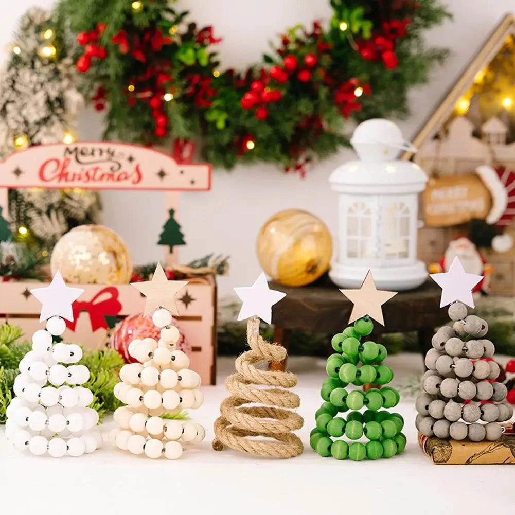 Handmade wooden bead Christmas trees tabletop decoration with stars in festive setting