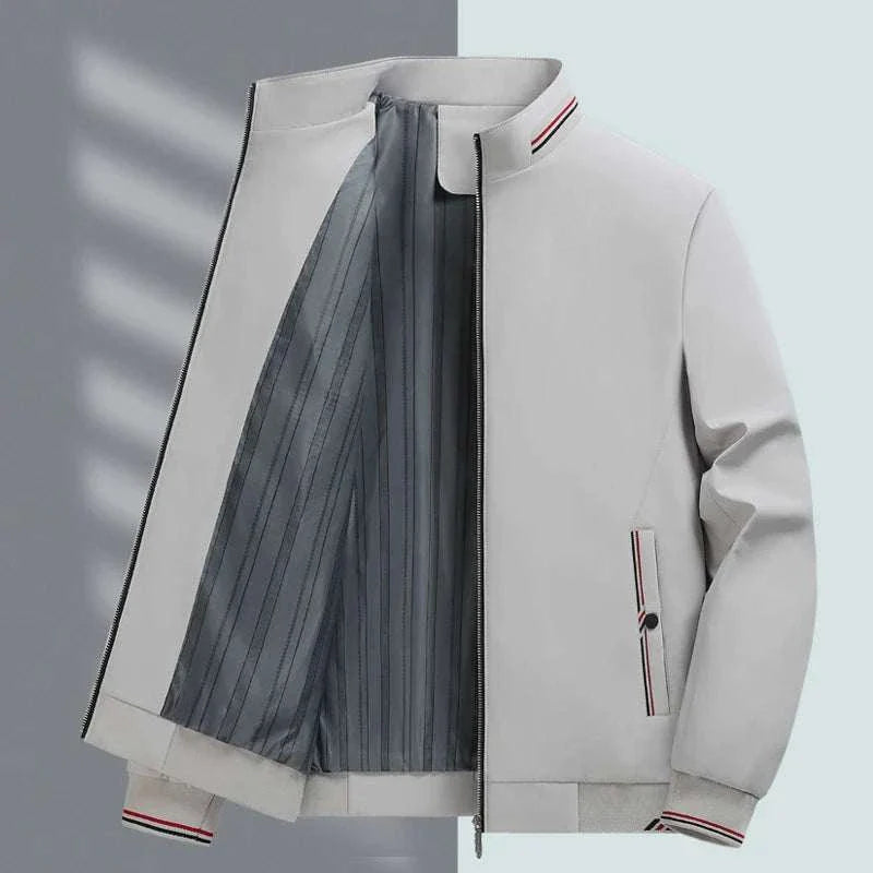Mens casual jacket with stand collar, zipper closure, polyester lining, slim fit, and windproof design.