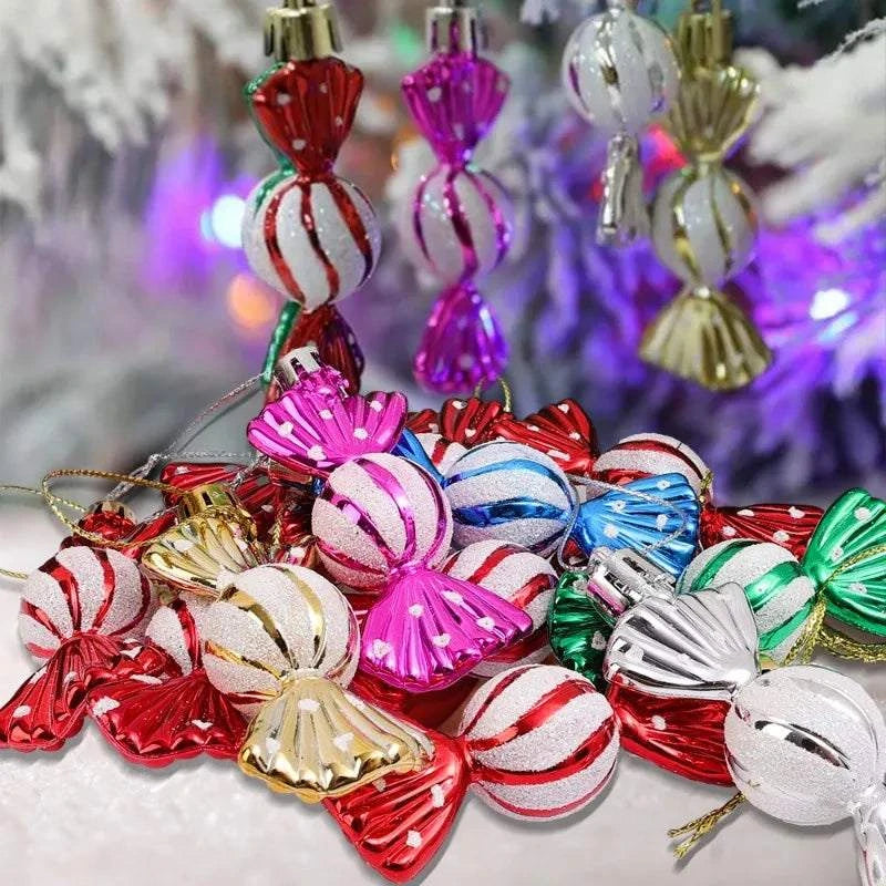 Colorful candy-shaped Christmas tree decorations in red, gold, silver, pink, blue, and green glitter finish