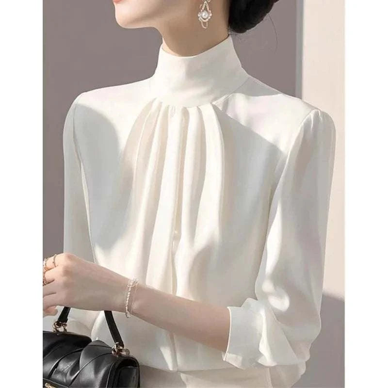 Elegant white long sleeve blouse for women with half high collar and loose fit, perfect spring office wear
