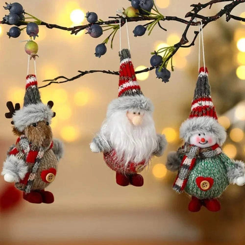 Colorful fabric and foam Christmas decorations featuring Santa, snowman, and reindeer hanging ornaments