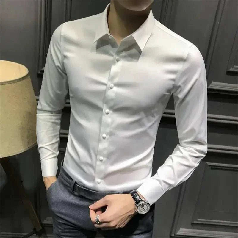 Elegant white men's shirt with long sleeves and turn-down collar, perfect for office and formal wear.