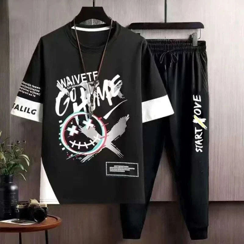 Men's black stylish tracksuit set with printed graphic tee and elastic jogging pants