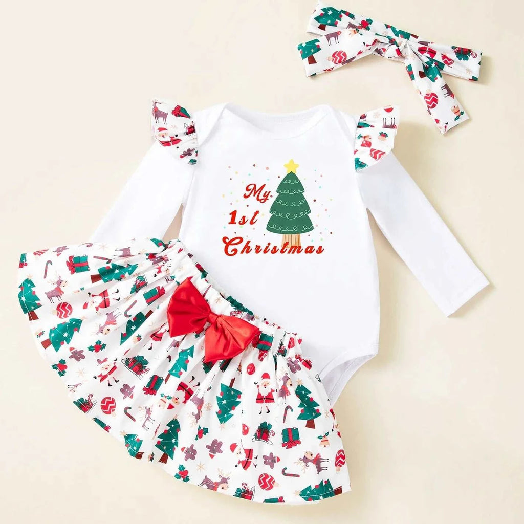 Baby girl first Christmas outfit white bodysuit with green tree print, matching tutu skirt with Christmas pattern and red bow, and festive headband