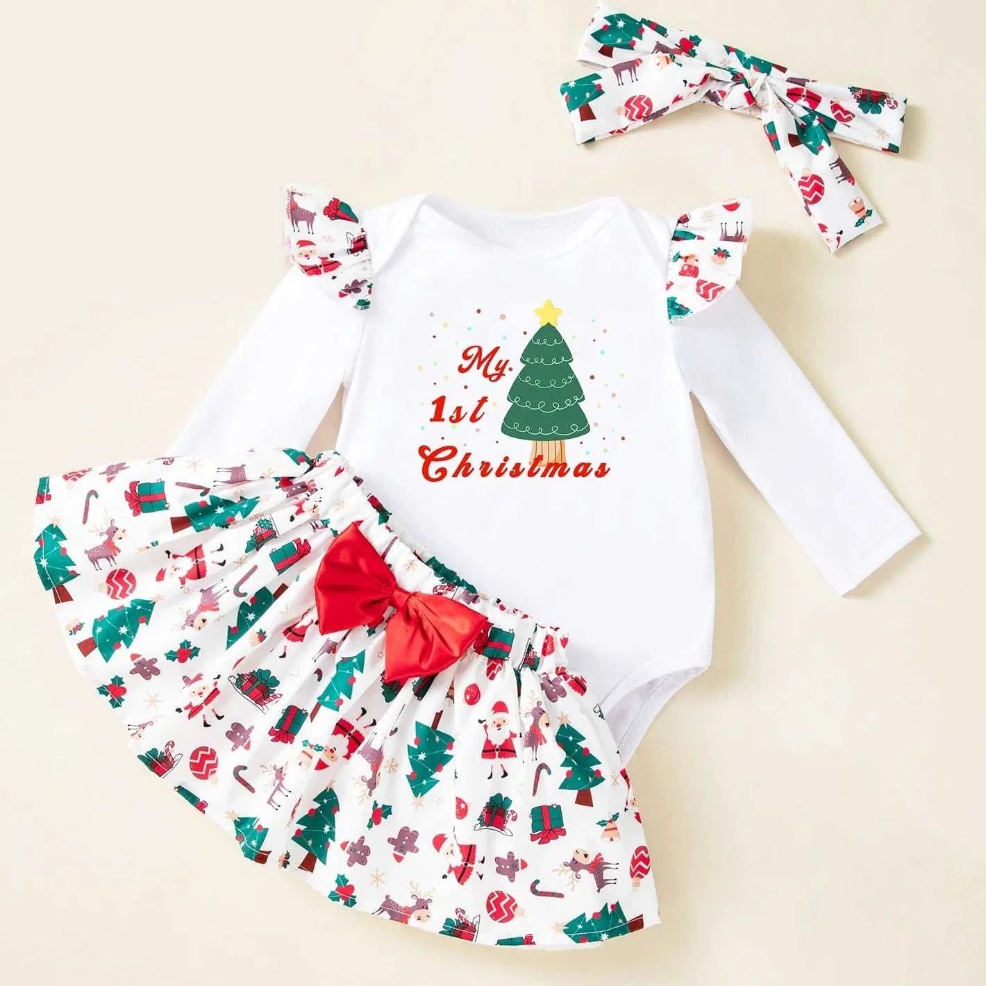 Baby girl first Christmas outfit white bodysuit with green tree print, matching tutu skirt with Christmas pattern and red bow, and festive headband