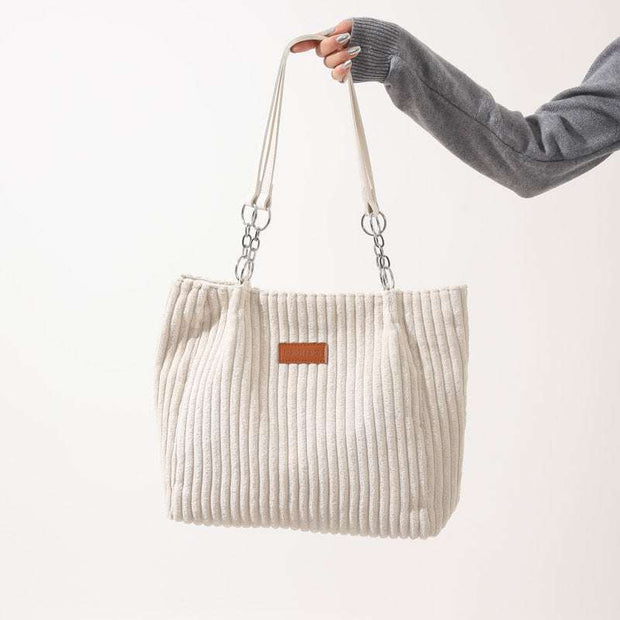 Creamy-white corduroy large capacity tote bag for autumn and winter with double shoulder straps and chain accents