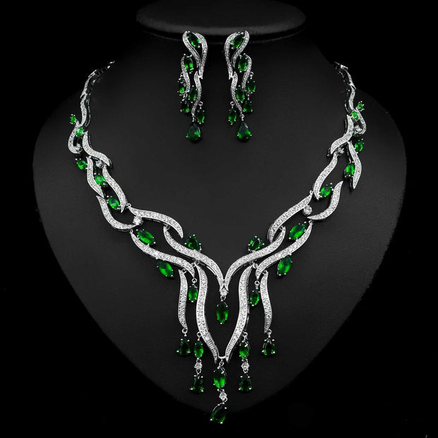 Elegant crystal jewelry set with green zircon tassel pendant and matching earrings