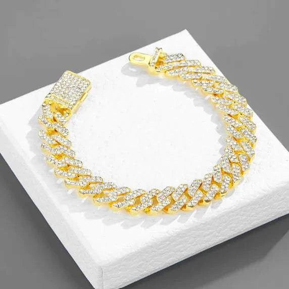 Necklace - Dazzling Diamond-Encrusted Hip-Hop Jewelry displayed on a white box, featuring a gold and diamond design.