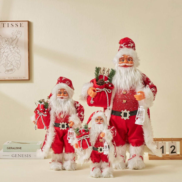 Set of three Christmas doll ornaments dressed as Santa Claus in red outfits with white fur trim, holding gifts and lanterns, European-American classic style