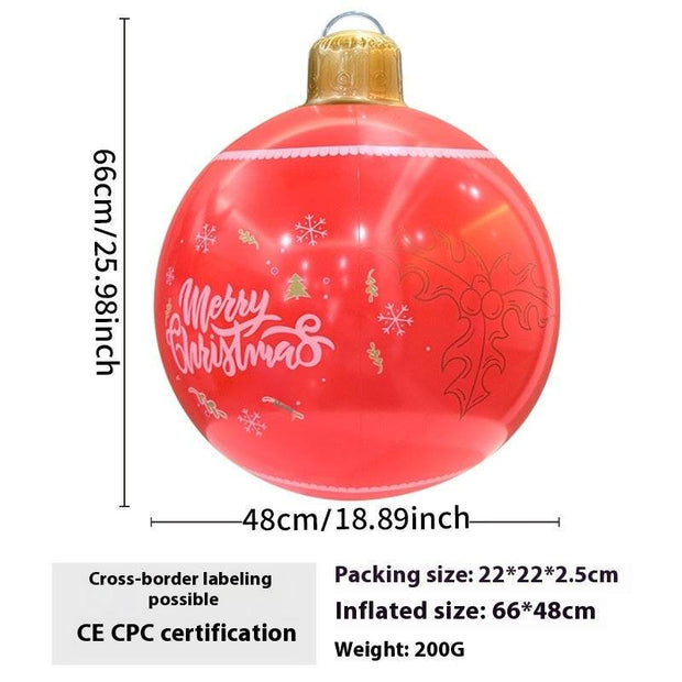 Red inflatable Christmas ball with "Merry Christmas" text and festive snowflake and holly designs, 66x48 cm, outdoor decoration