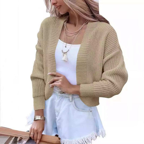 Women's short cape knitted cardigan sweater in camel color with long sleeves and polyester fabric.