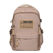 Solid multi-pocket nylon backpack for junior high students, large capacity, beige color, Korean style schoolbag