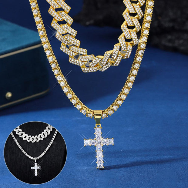 Gold zircon cross pendant necklace with Miami curb Cuban chain on blue background
