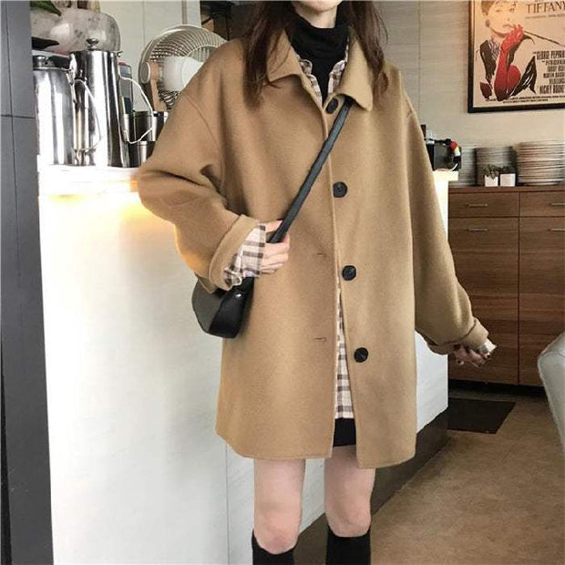 Women's khaki Korean-style loose mid-length overcoat with button closure and long sleeves