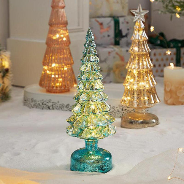 Glittered geometric glass Christmas tree table decorations with warm lights for festive scenes