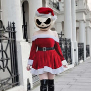 Women's red off-shoulder Christmas costume dress with white plush trim and black belt, styled for holiday parties