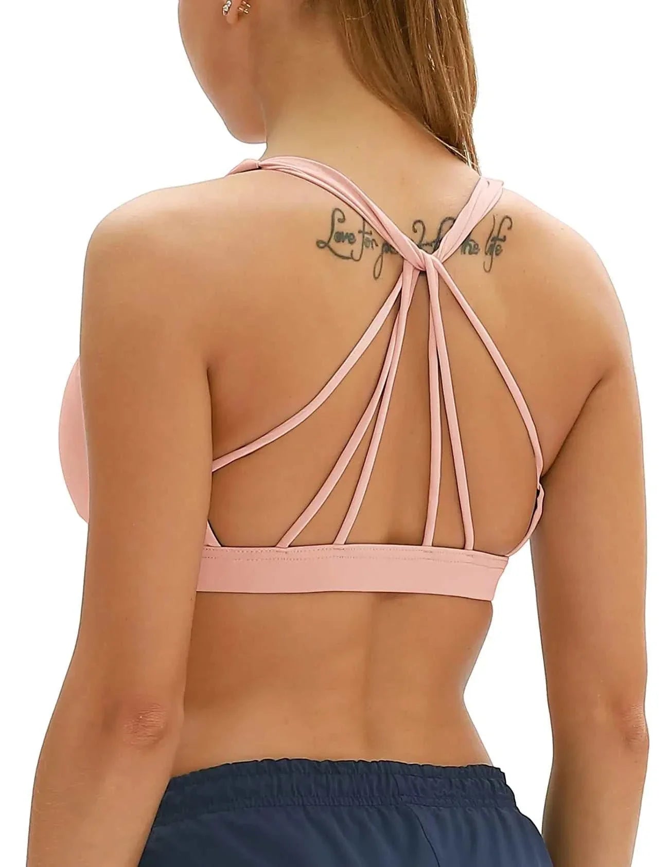 Icyzone padded strappy sports bra back view in pink with crisscross straps
